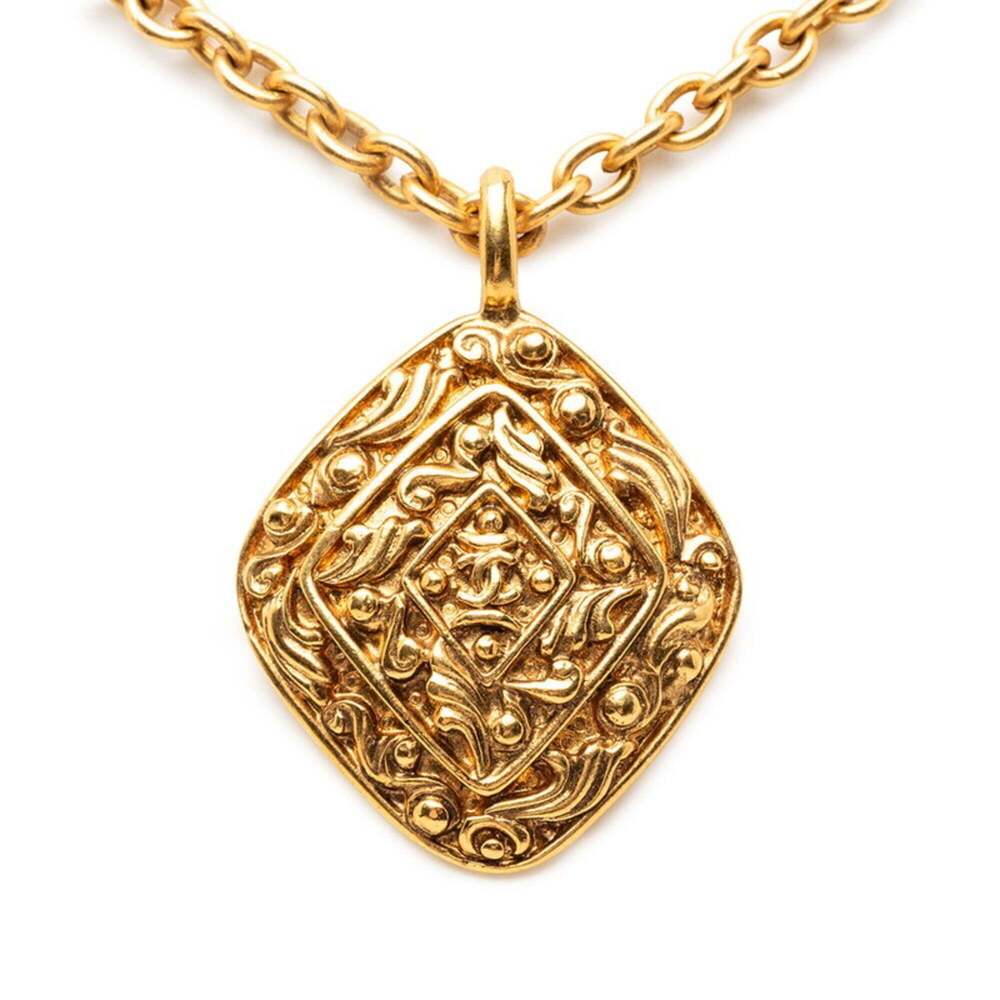 CHANEL Gold Diamond Logo Necklace